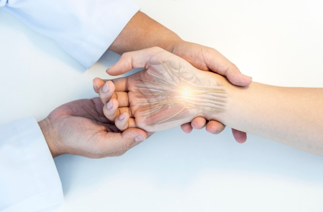 Doctor examining patient with carpal tunnel syndrome