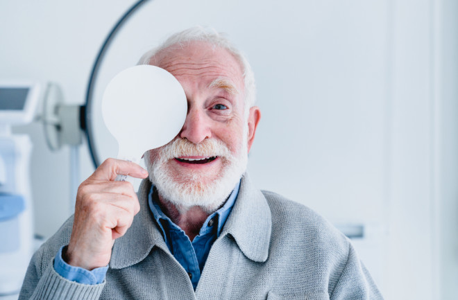 older man taking an eye exam