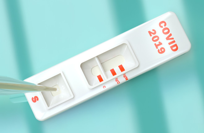 antibody test covid blue background - shutterstock