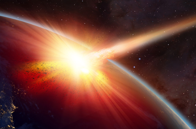 comet asteroid hitting planet earth in space - shutterstock