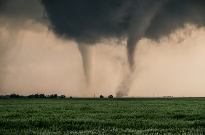 A pair of tornadoes take a destructive path through northern Oklahoma farmyards near Cherokee