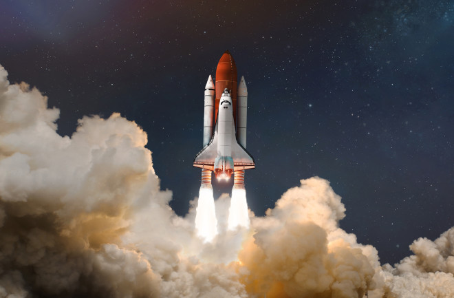 Space shuttle rocket launch in the clouds with stars to outer space. Space on background. Sky and clouds. Spaceship flight. Elements of this image furnished by NASA