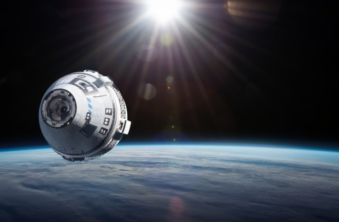 The NASA Starliner in space, traveling to the ISS