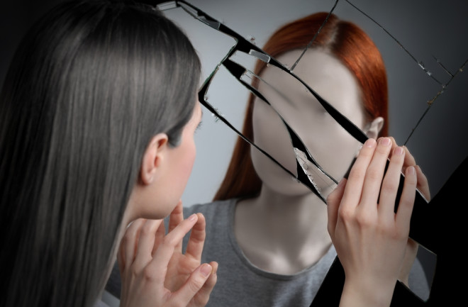 woman suffering psychological hallucinations doppelganger