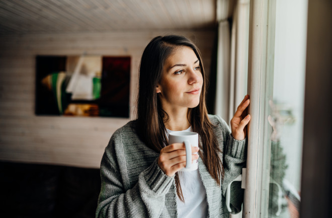 Woman thinking by a window