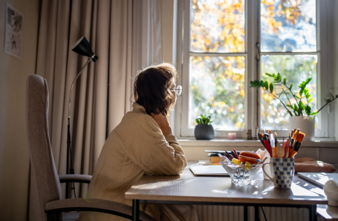 woman with ADHD looking out window