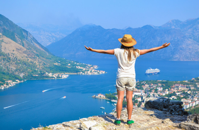 Young tourist woman enjoying view of kotor